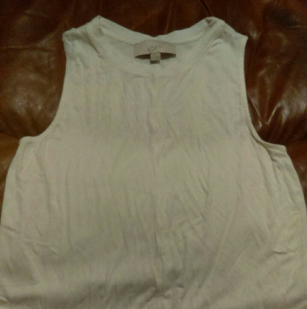 Sleeveless white blouse